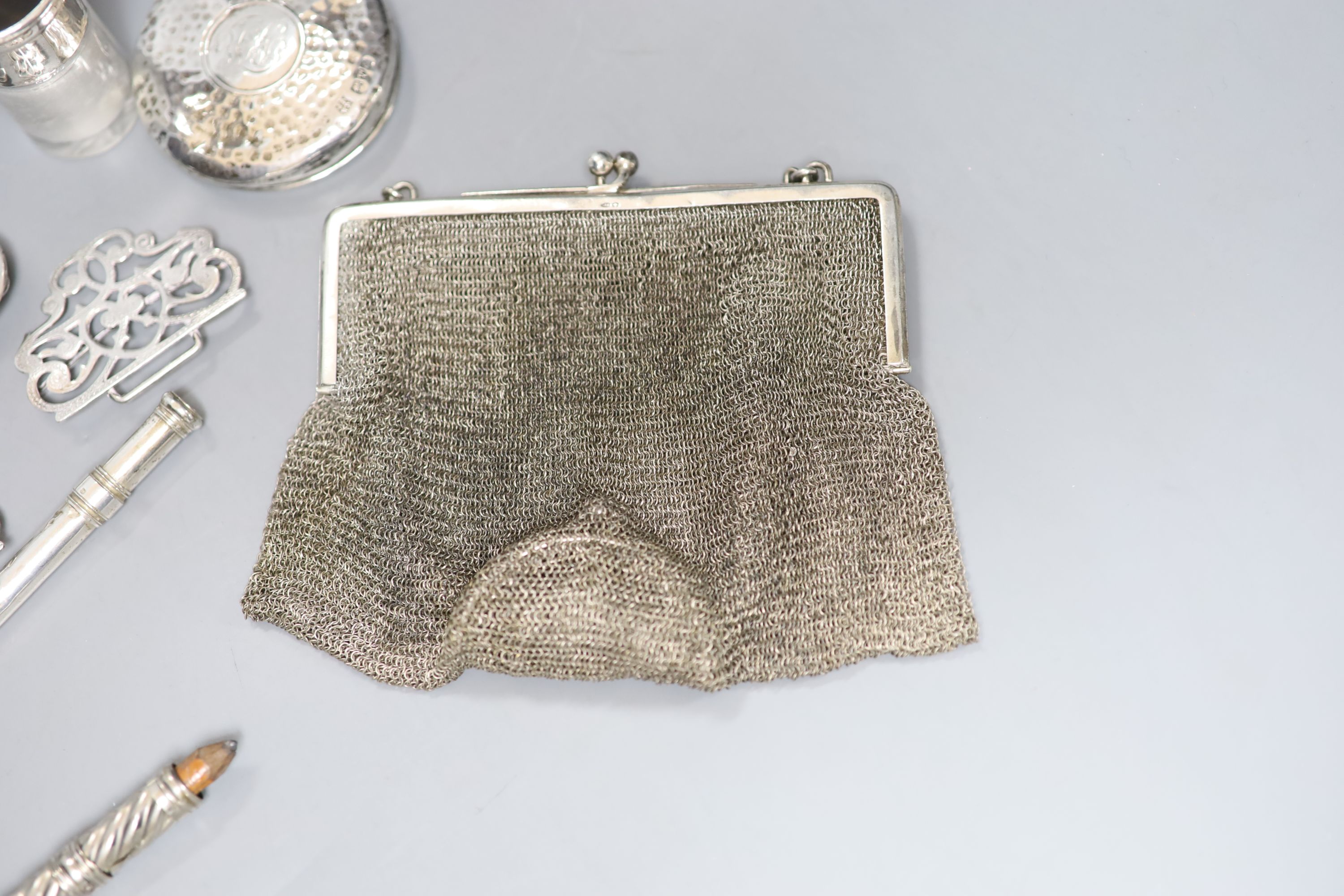A group of small silver including mesh evening bag, buckles, salts bottle etc.